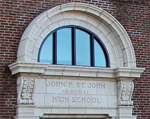 photo of stone doorway arch at John P. St. John Memorial High School 