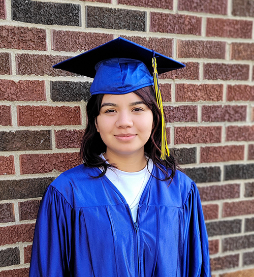 girl in graduation cap and gown