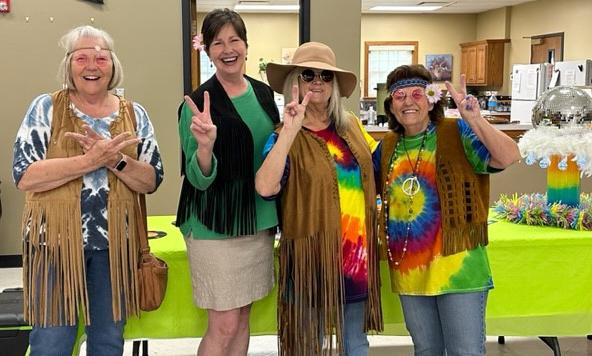 women dressed in hippie clothing