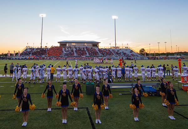 cheerleaders and football game