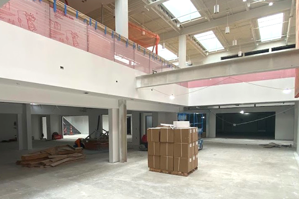 lower level open area with two-story atrium above it