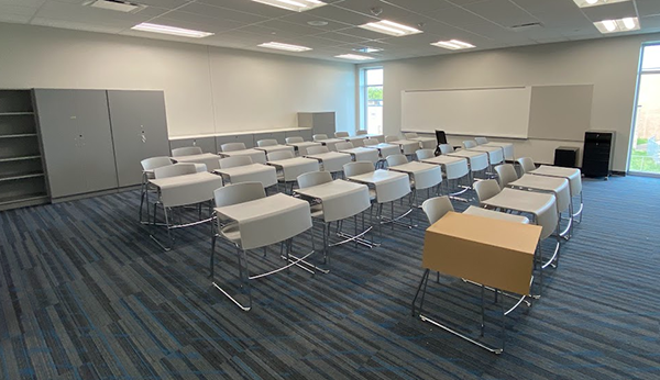 student desks in a classroom