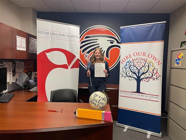 Katelyn E with signed contract