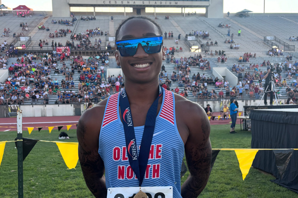Jaalan wears his championship medal